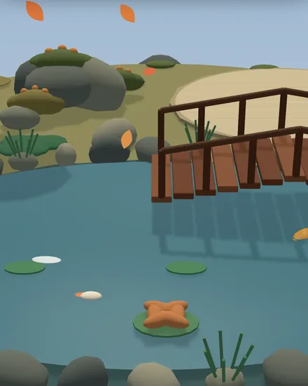 A close view of the pond, the lily pads and the bridge.