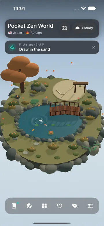 A ripple spreading on the pond next to freshly raked sand.