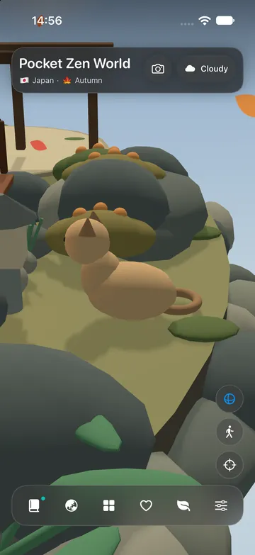 A close-up of Momo the cat beside mossy stones.